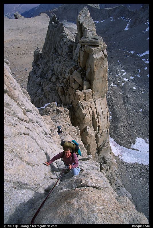 Man climbing East face of Mt Whitney. Sequoia National Park, California
