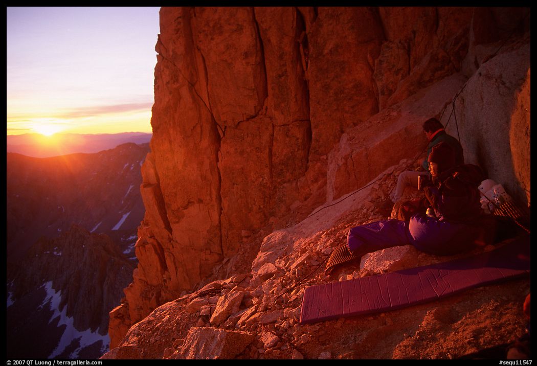 Mountaineers on a bivy on Mt Whitney at sunrise. Sequoia National Park, California