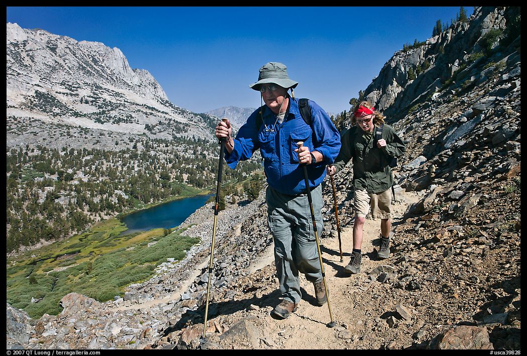 Father and son on trail above Long Lake, John Muir Wilderness. Kings Canyon National Park, California