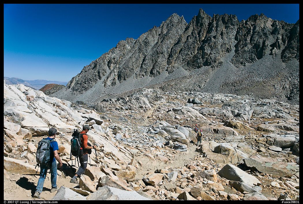 Hikers below Bishop Pass, John Muir Wilderness. Kings Canyon National Park, California