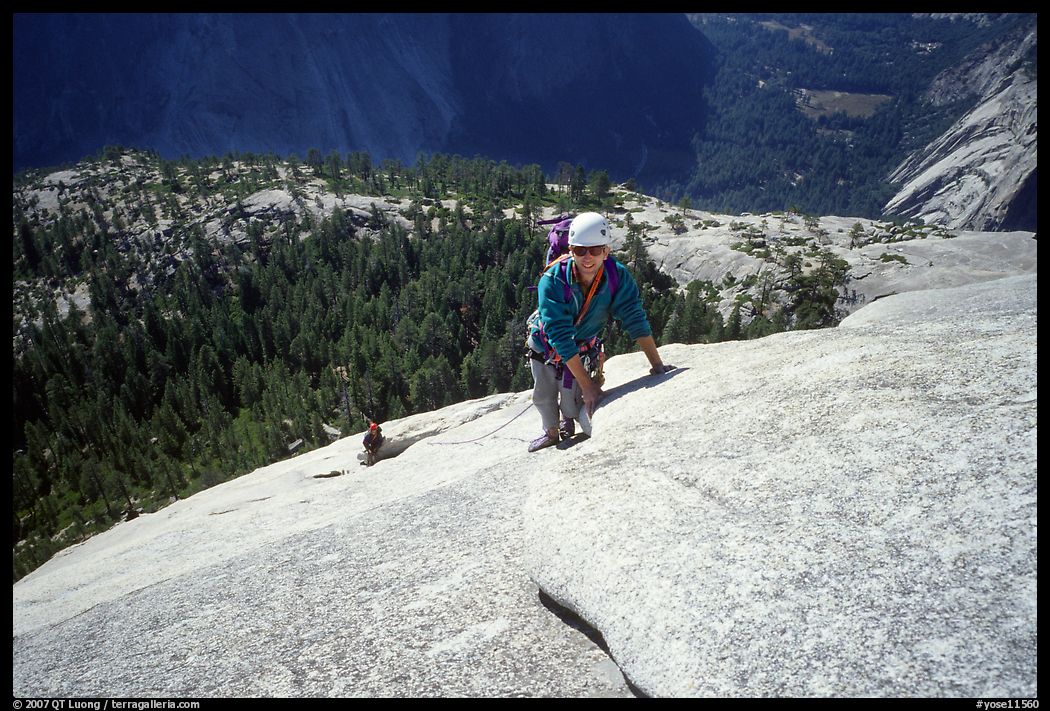 Rock climbers on the Snake Dike route, Half-Dome. Yosemite National Park, California