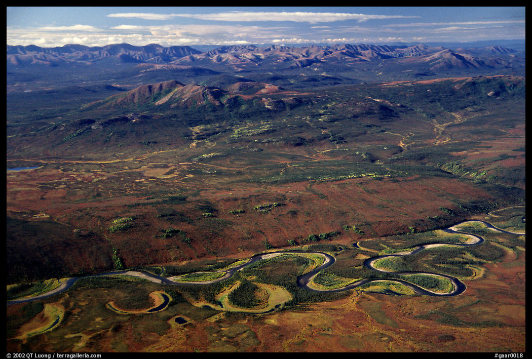 Aerial view of plain with meandering Alatna river and mountains. Gates of the Arctic National Park, Alaska, USA.