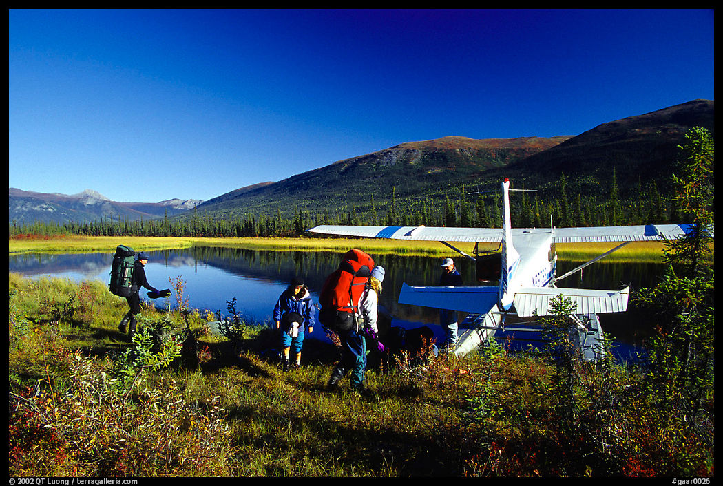 Backpackers beeing picked up by a floatplane at Circle Lake. Gates of the Arctic National Park, Alaska