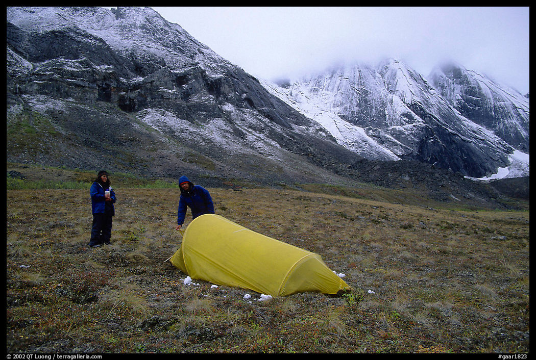 Backpackers camp at the base of the Arrigetch Peaks. Gates of the Arctic National Park, Alaska
