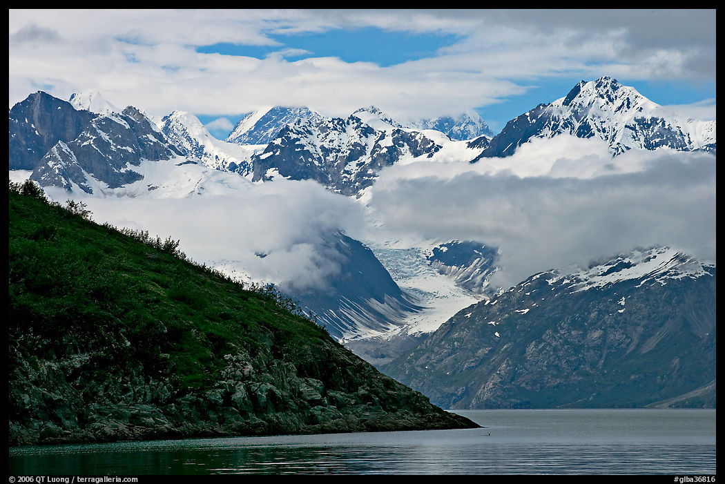 Peaks of Fairweather range with clearing clouds. Glacier Bay National Park, Alaska, USA.