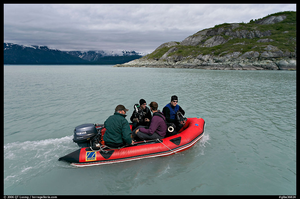 Film crew preparing for landing in a Zodiac. Glacier Bay National Park, Alaska, USA.