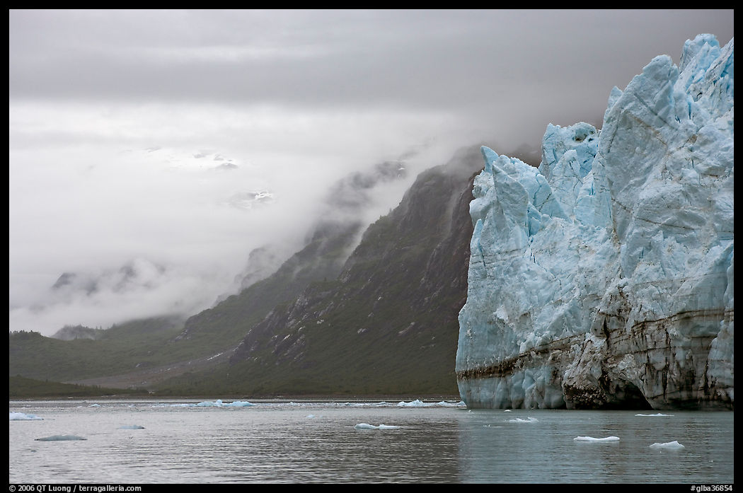 Margerie Glacier and foggy mountains surrounding Tarr Inlet. Glacier Bay National Park, Alaska, USA.