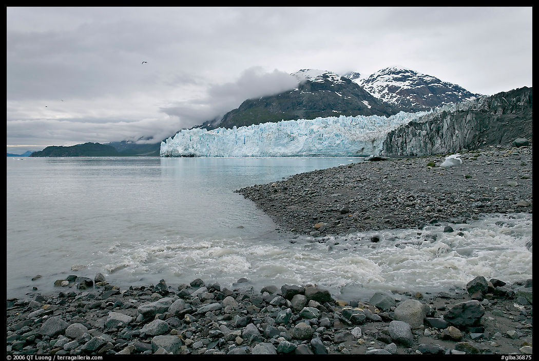 Stream flowing into Tarr Inlet, and Margerie Glacier. Glacier Bay National Park, Alaska, USA.