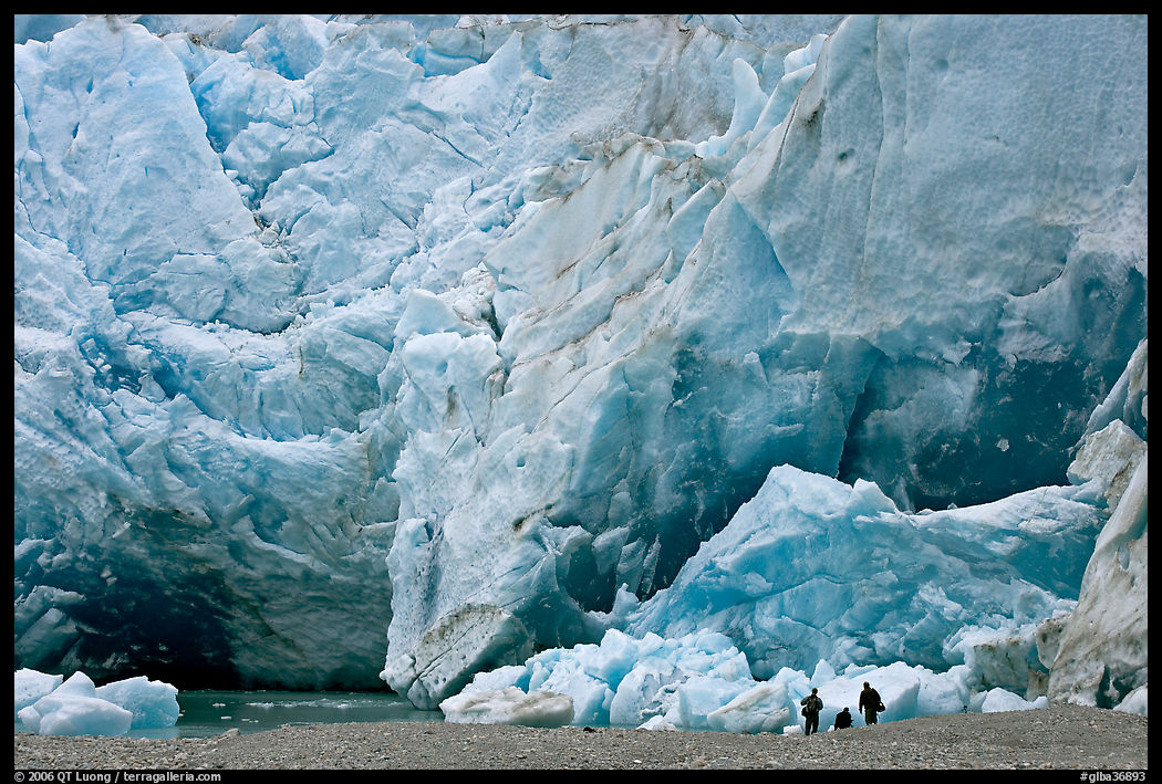 People at the base of Reid Glacier. Glacier Bay National Park, Alaska, USA.
