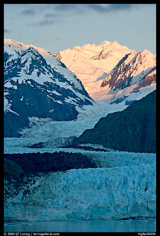 Margerie Glacier flowing from Mount Fairweather into the Tarr Inlet, sunrise. Glacier Bay National Park, Alaska, USA.
