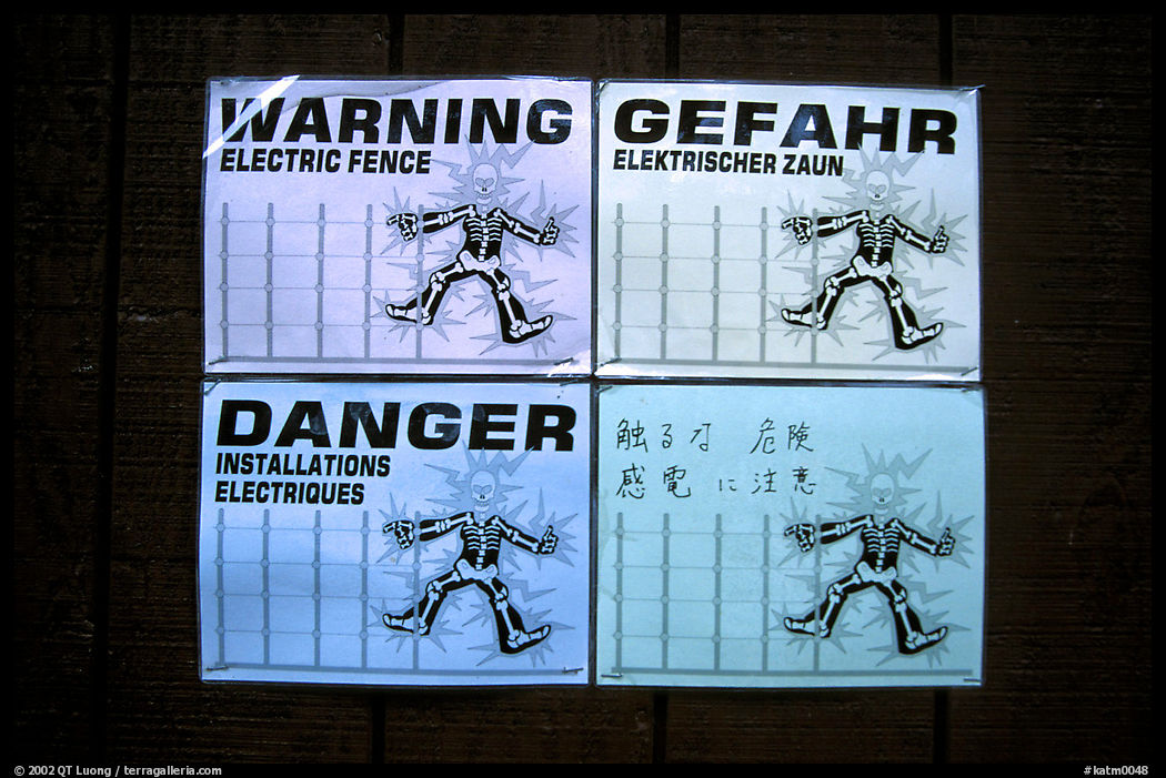 Sign in Brooks campground, warning of the electric fence used to keep the bears out. Katmai National Park, Alaska, USA.