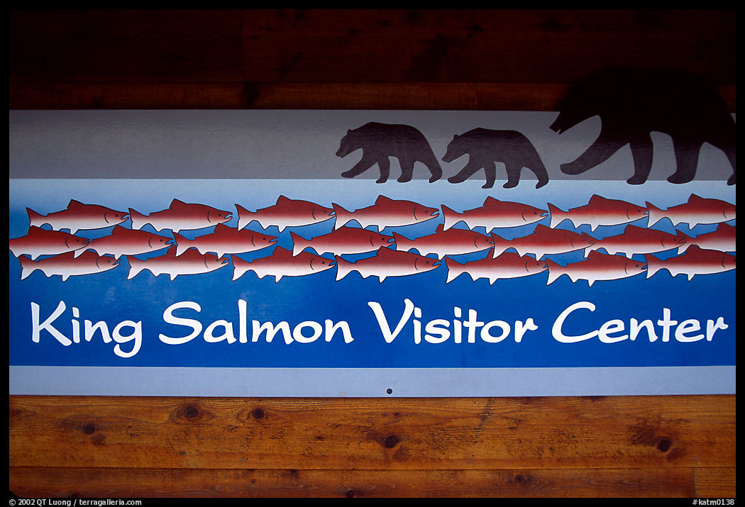 Bears and salmon on visitor center sign. Katmai National Park, Alaska, USA.