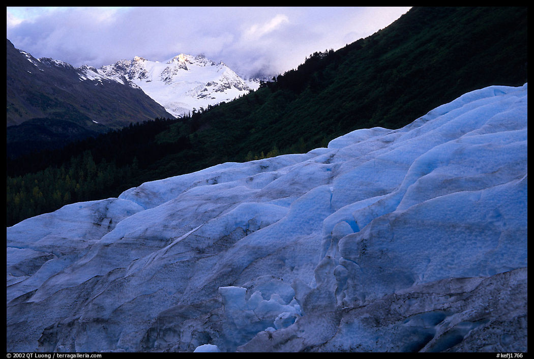 Alaskan Glacier seen from the side, and peaks. Kenai Fjords  National Park, Alaska, USA.