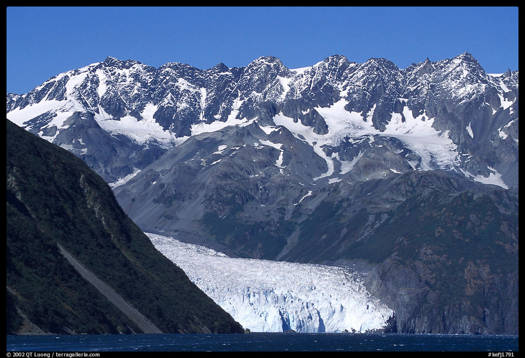 Aialik Glacier, fjord,  and steep mountains. Kenai Fjords  National Park, Alaska, USA.