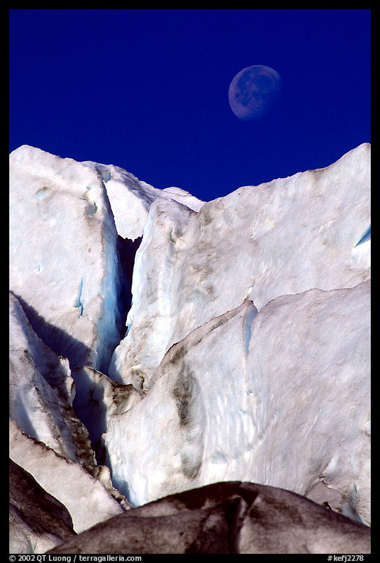 Seracs of Exit Glacier and moon. Kenai Fjords  National Park, Alaska, USA.