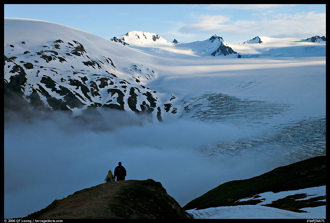 Two people hiking down Harding Ice Field trail. Kenai Fjords  National Park, Alaska, USA.