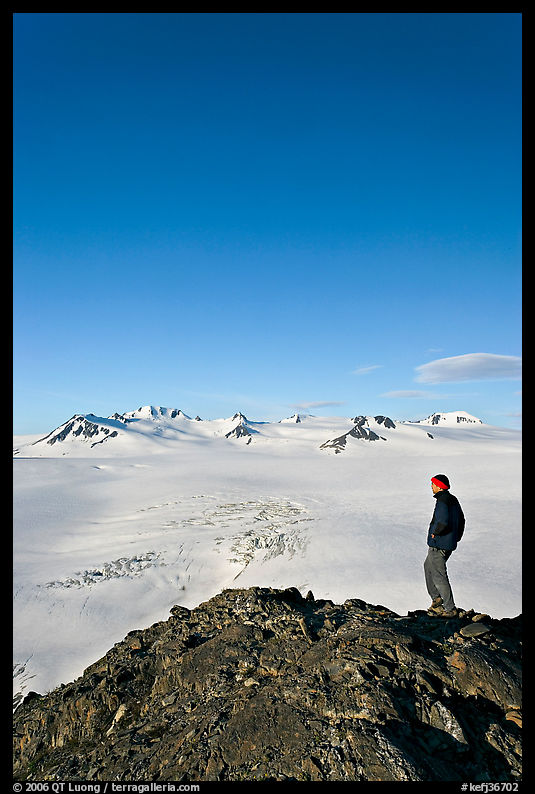 Hiker looking at the Harding icefield. Kenai Fjords  National Park, Alaska, USA.