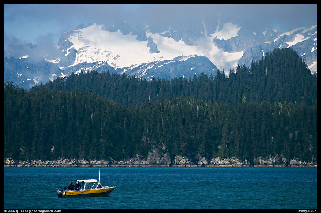 Small boat in Aialik Bay. Kenai Fjords  National Park, Alaska, USA.