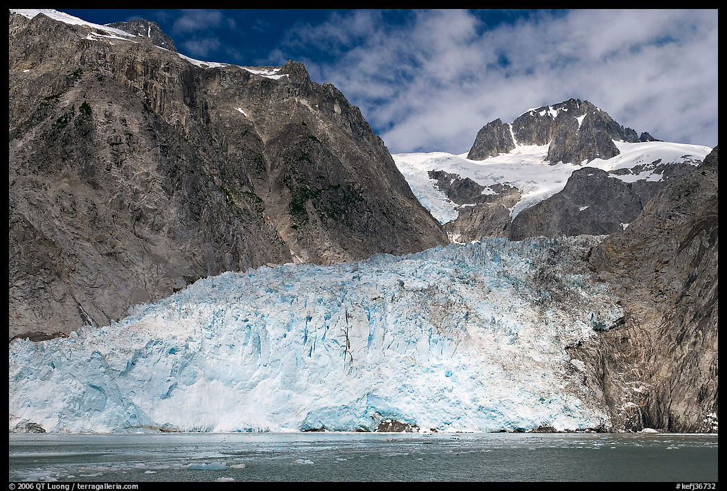 Northwestern tidewater glacier and steep cliffs, Northwestern Fjord. Kenai Fjords  National Park, Alaska, USA.