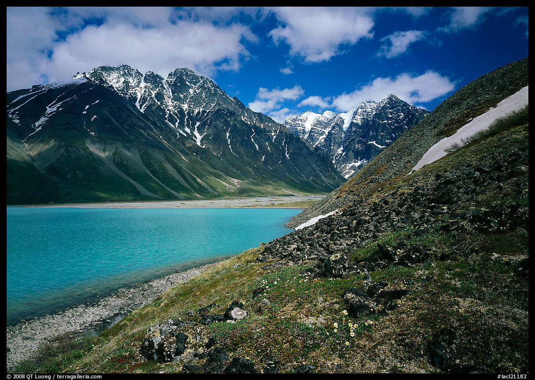 Tundra and mountains raising above Turquoise Lake. Lake Clark National Park, Alaska, USA.