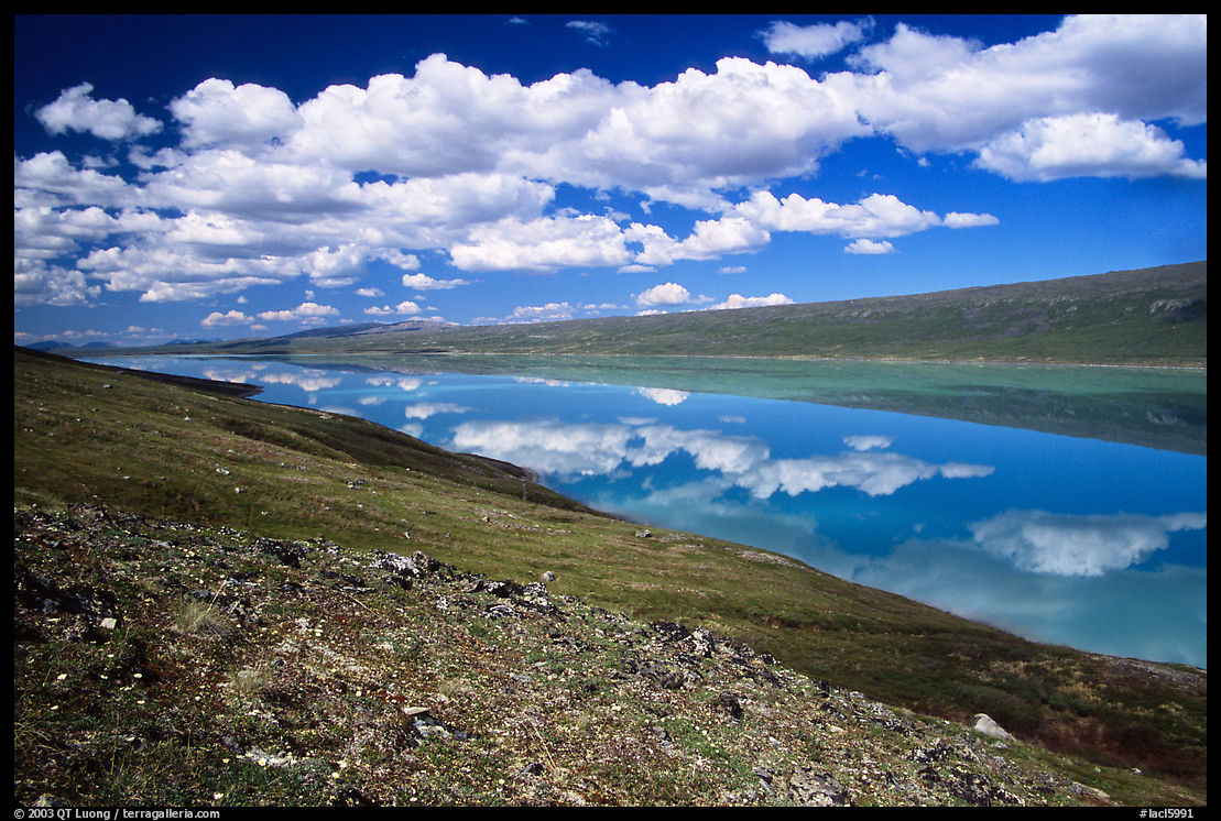 Turquoise Lake and clouds. Lake Clark National Park, Alaska, USA.