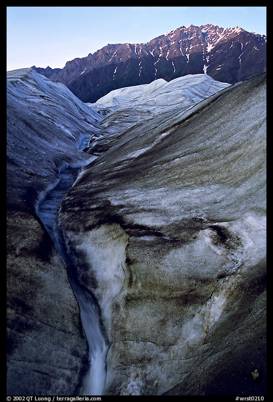 Root Glacier with glacial stream, and mountains. Wrangell-St Elias National Park