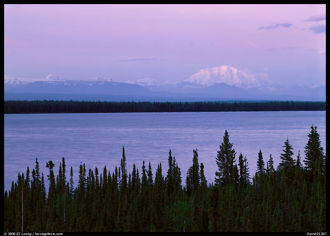 Wrangell range and Mt Blackburn above Willow Lake with pink sunset hues. Wrangell-St Elias National Park, Alaska, USA.