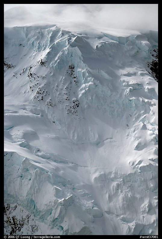 Aerial view of icy face with hanging glaciers and seracs. Wrangell-St Elias National Park, Alaska, USA.