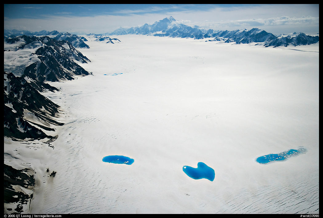 Aerial view of Bagley Field with turquoise snow melt lakes. Wrangell-St Elias National Park, Alaska, USA.