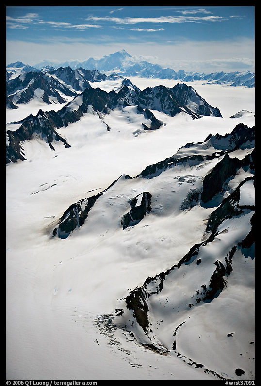 Aerial view of mountains with Mt St Elias in background. Wrangell-St Elias National Park, Alaska, USA.