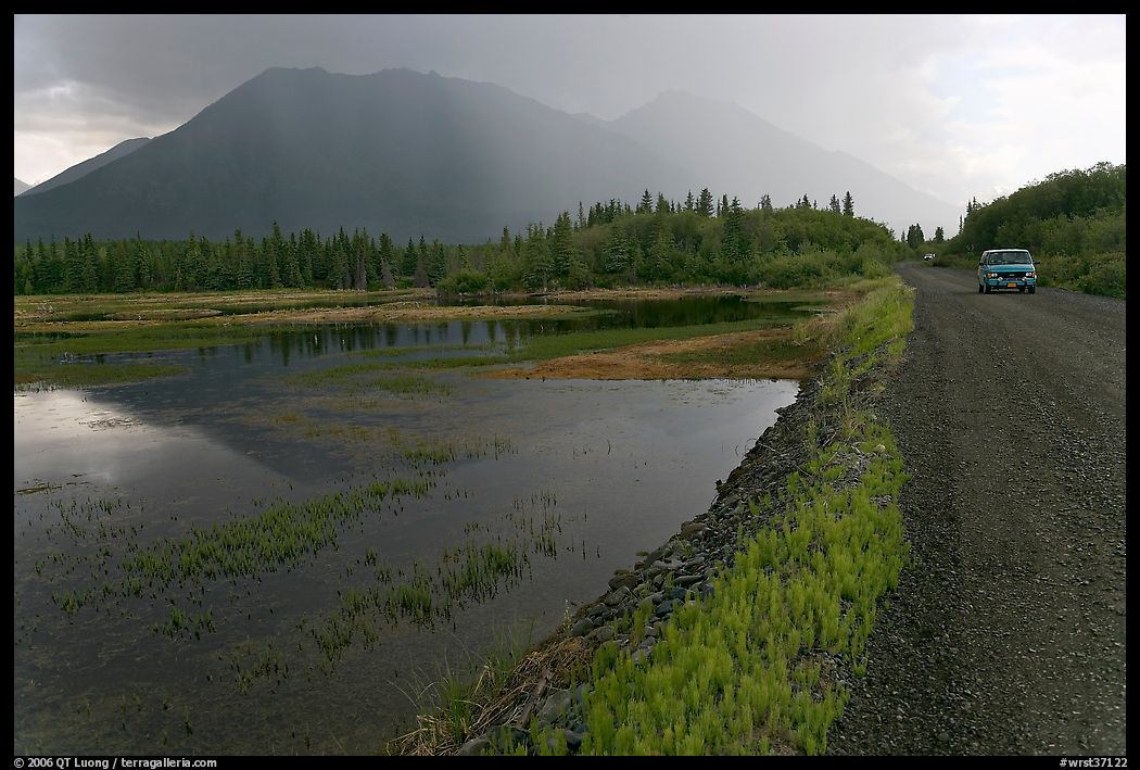 McCarthy Road and lake during afternoon storm. Wrangell-St Elias National Park, Alaska, USA.