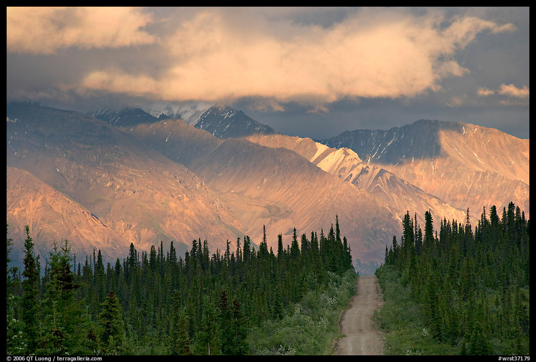 Road and Nutzotin Mountains at sunset. Wrangell-St Elias National Park, Alaska, USA.