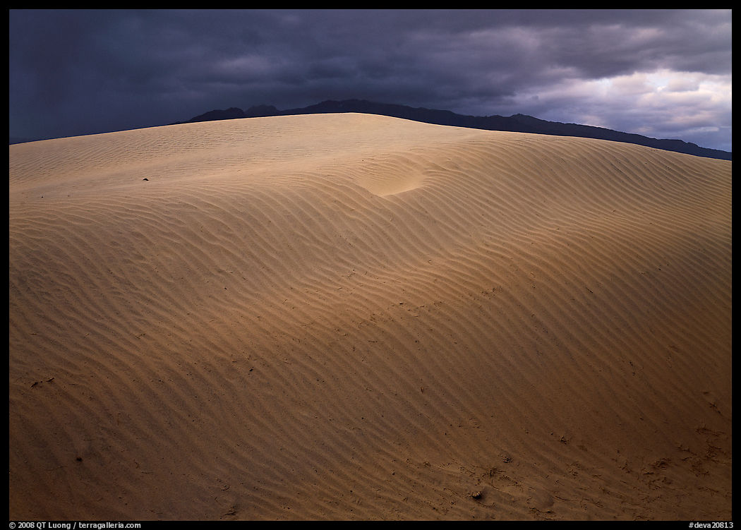Dunes under rare stormy sky. Death Valley National Park, California, USA.
