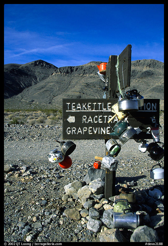 Teakettle Junction sign, adorned with teakettles. Death Valley National Park, California, USA.