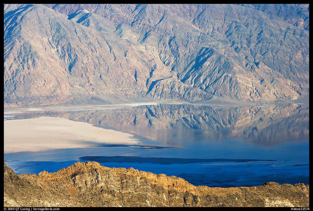 Rare seasonal lake on Death Valley floor and Black range, seen from above, late afternoon. Death Valley National Park, California, USA.