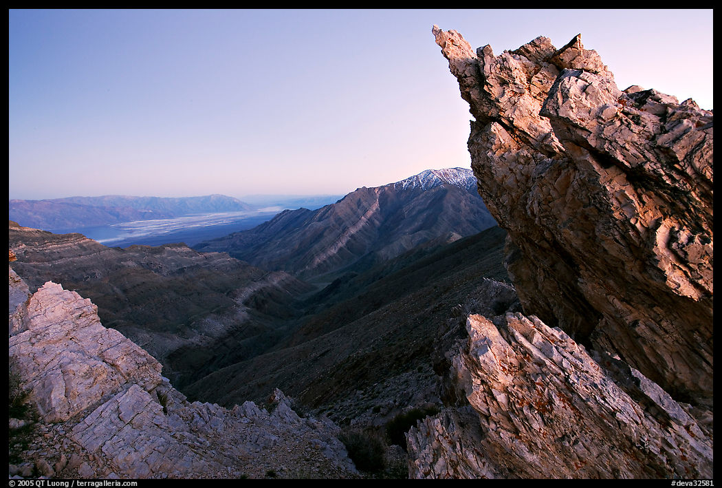 Rocks framing the Death Valley view from Aguereberry point, dusk. Death Valley National Park, California, USA.