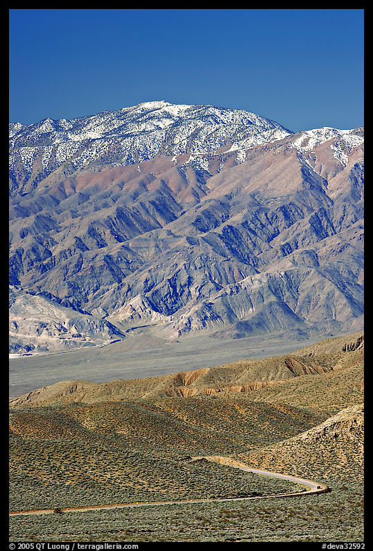 Road below Mountains above Emigrant Pass. Death Valley National Park, California, USA.