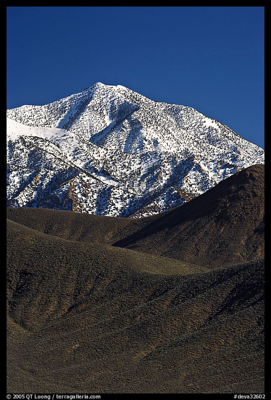 Telescope peak rising above sage-covered hills. Death Valley National Park, California, USA.