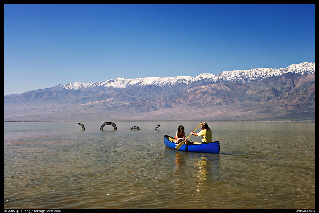 Canoe near the dragon in Manly Lake, below the Panamint Range. Death Valley National Park, California, USA.