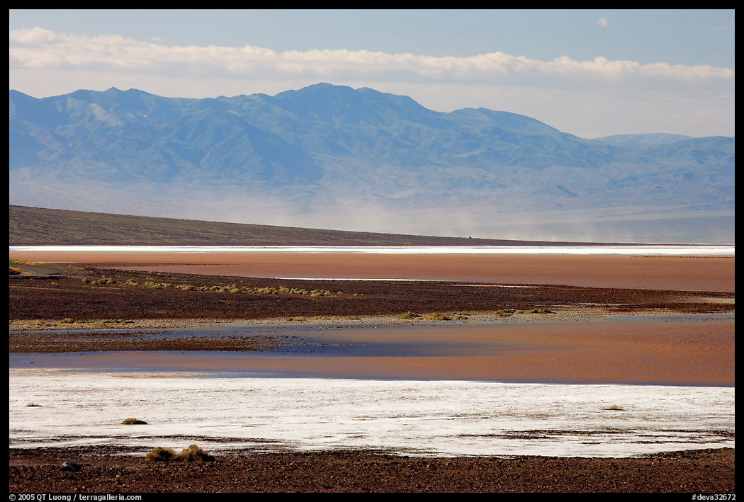 Salt Flats on Valley floor and Owlshead Mountains, early morning. Death Valley National Park, California, USA.