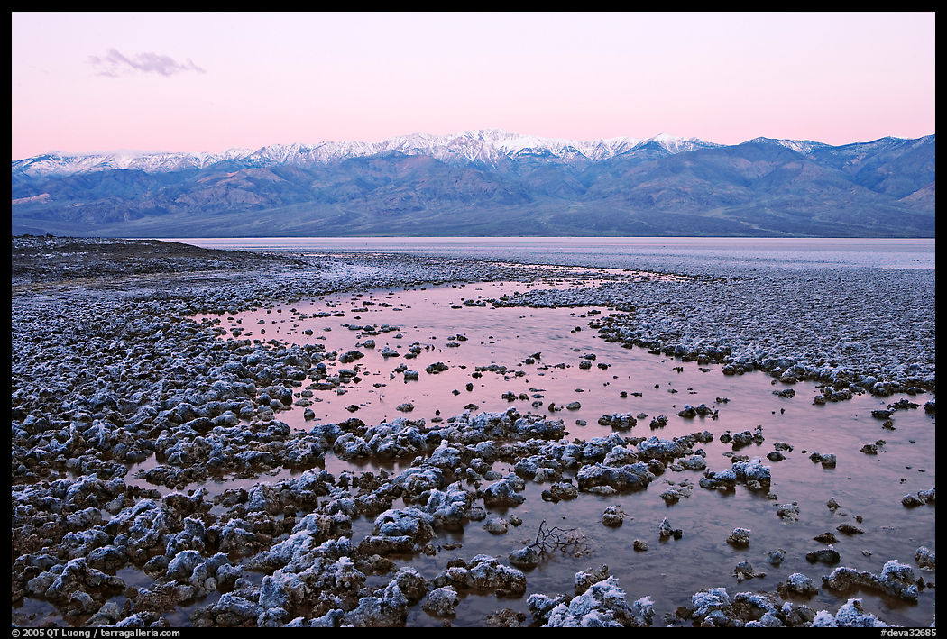 Pond and salt formations, Badwater, dawn. Death Valley National Park, California, USA.