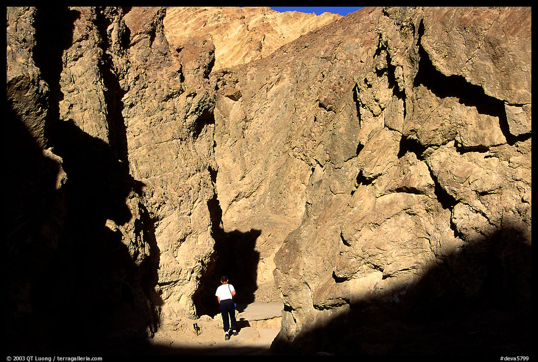 Hiker in Golden Canyon. Death Valley National Park, California, USA.