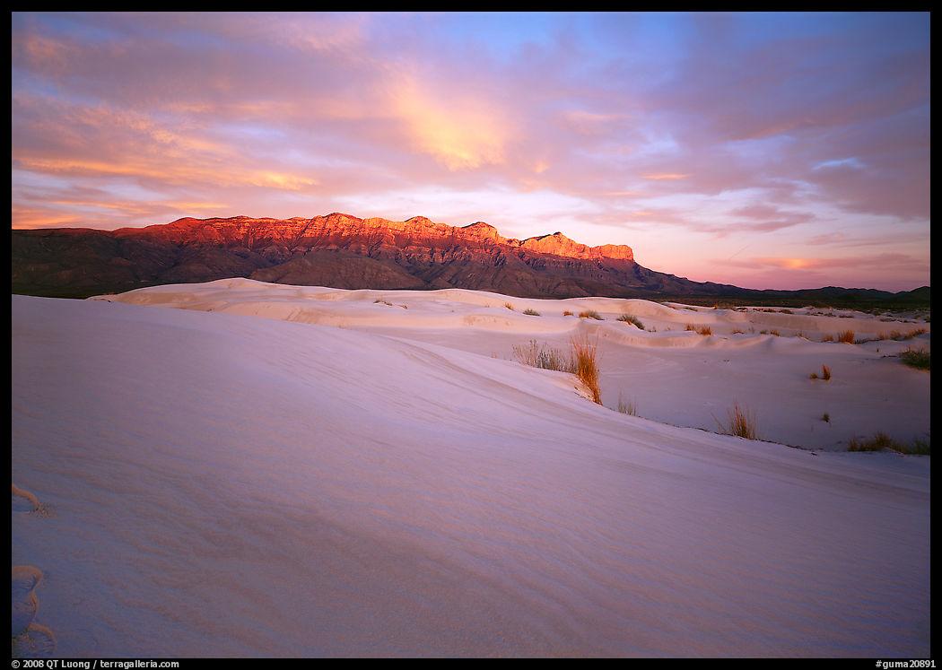 White gypsum dunes and Guadalupe range at sunset. Guadalupe Mountains National Park, Texas, USA.