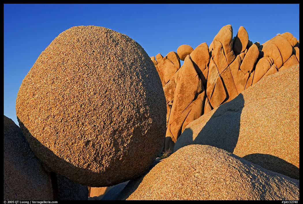 Round and triangular Boulders, Jumbo Rocks campground, sunset. Joshua Tree  National Park, California, USA.