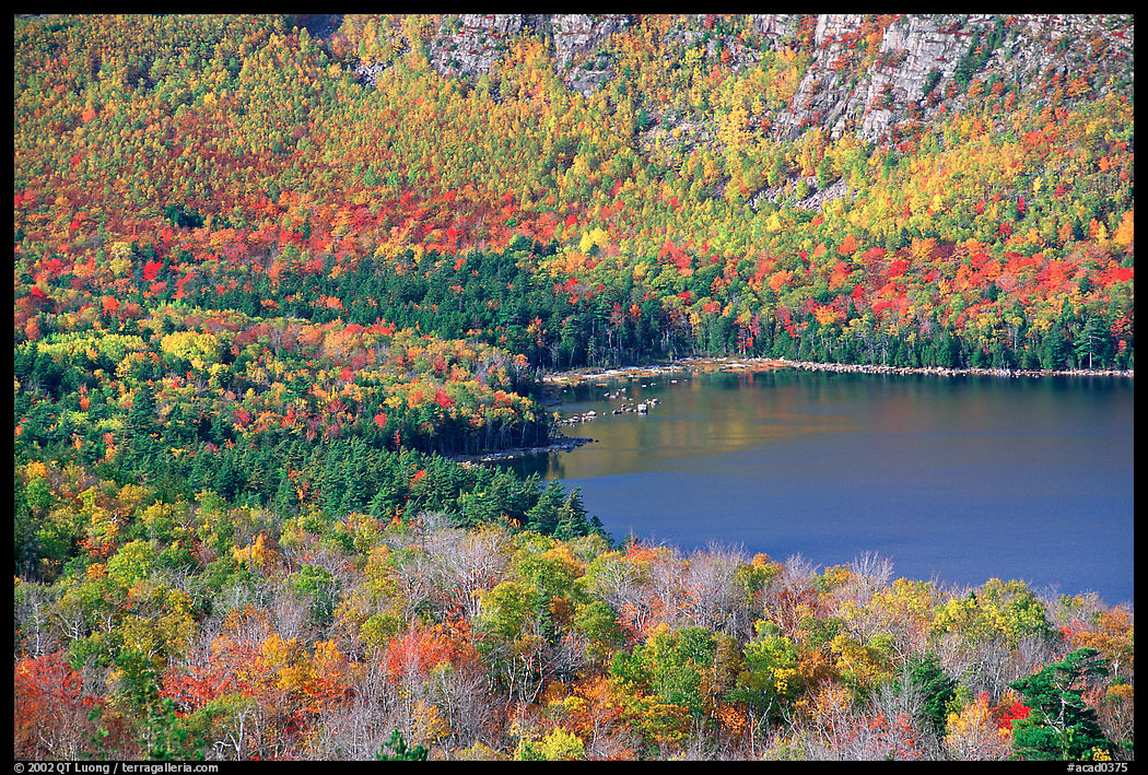 Jordan pond, surrounded by slopes in fall foliage. Acadia National Park, Maine, USA.