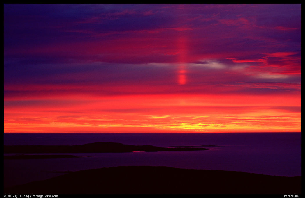 First sunrays to reach North America, seen from the top of Cadillac mountain. Acadia National Park, Maine, USA.