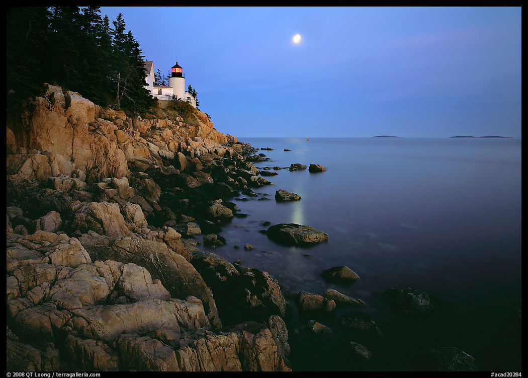 Bass Harbor Lighthouse, moon and reflection. Acadia National Park, Maine, USA.