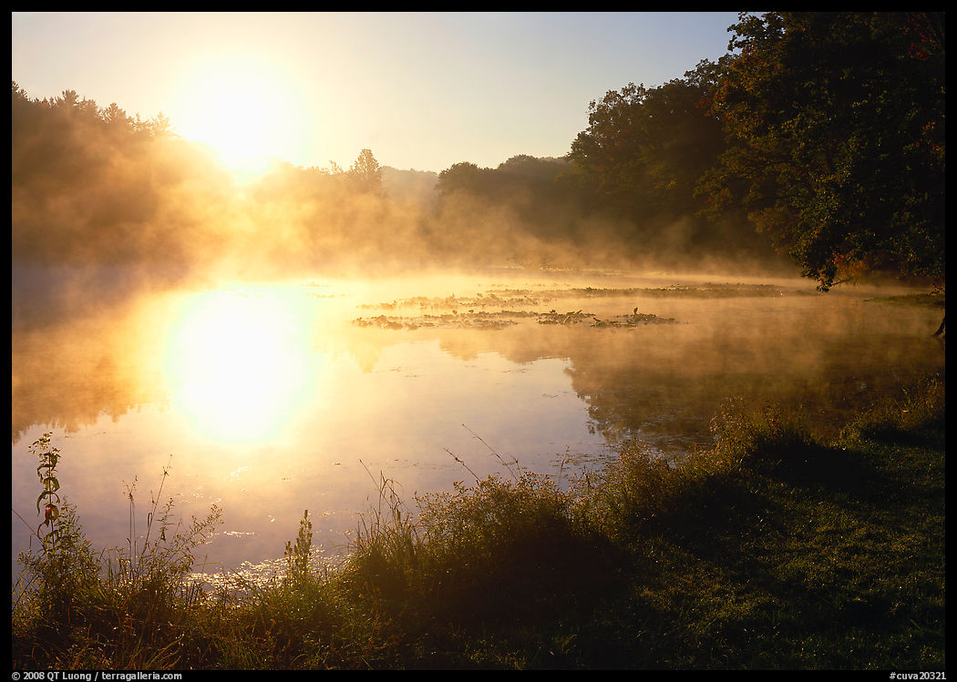 Sun shining through mist, Kendall Lake. Cuyahoga Valley National Park, Ohio, USA.