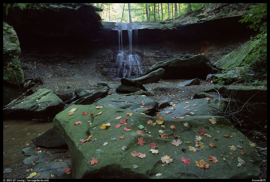 Depression with green rocks and Blue Hen Falls. Cuyahoga Valley National Park, Ohio, USA.