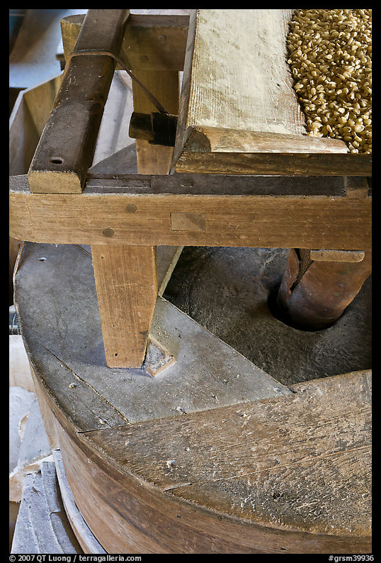 Corn being grinded into flour, Mingus Mill, North Carolina. Great Smoky Mountains National Park, USA.